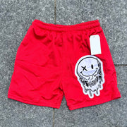 Fashion solid color smiley face shorts