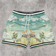 Art-inspired patterned mesh track shorts