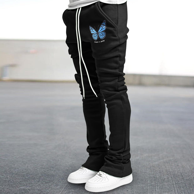 Slim fit flared trousers with vintage butterfly print