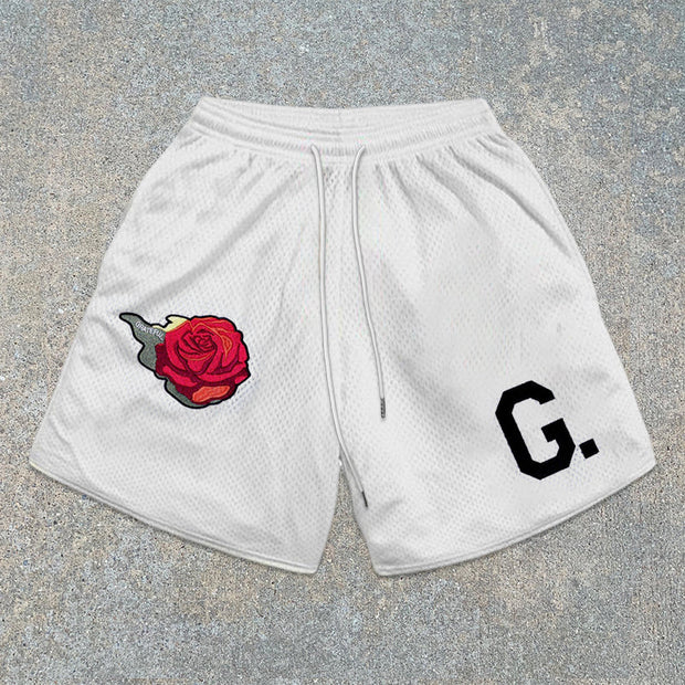 monogram mesh track shorts