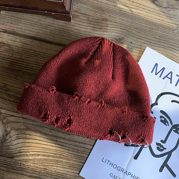 Trendy retro ripped knitted hat to keep warm