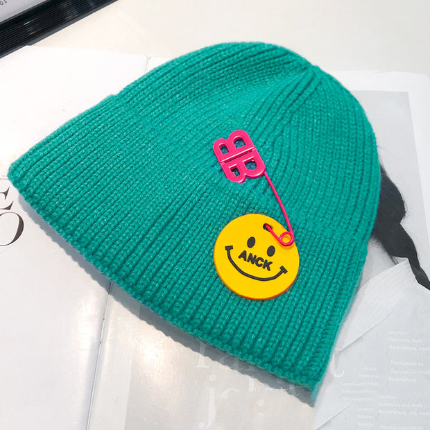 Fashion trend knitted hat female curled pin hip-hop smiley couple woolen hat winter warm hat male