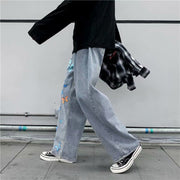 Butterfly print street denim trousers