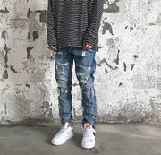 Vintage wash distressed straight ripped jeans