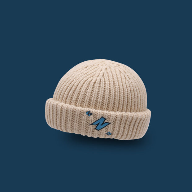 Letter embroidery woolen knit melon leather hat with flanging to keep warm