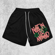 text-pattern mesh shorts