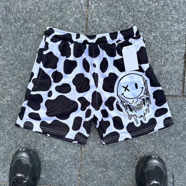Cow pattern smiley face shorts