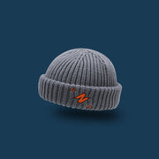 Letter embroidery woolen knit melon leather hat with flanging to keep warm