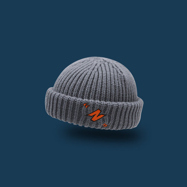 Letter embroidery woolen knit melon leather hat with flanging to keep warm