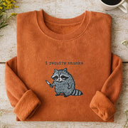 I Require Snacks Embroidered Raccoon Sweatshirt