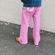 Fashionable personality contrast color fake two-piece trousers
