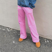 Fashionable personality contrast color fake two-piece trousers