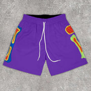 Statement bone print track shorts
