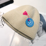 Fashion trend knitted hat female curled pin hip-hop smiley couple woolen hat winter warm hat male