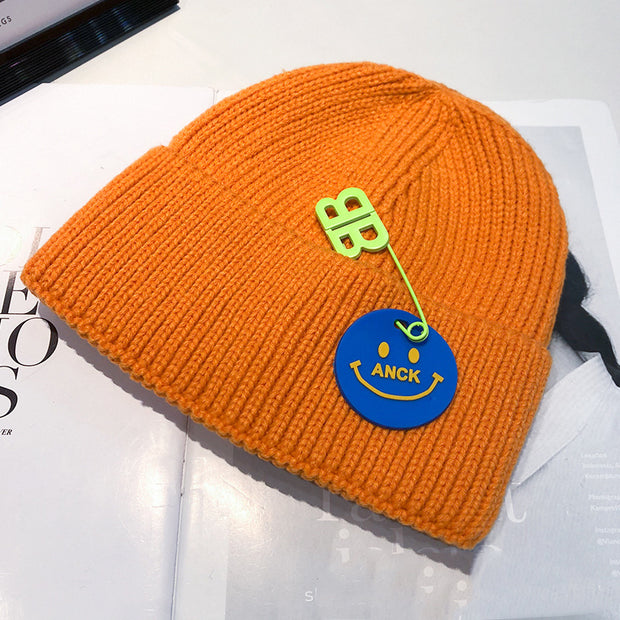 Fashion trend knitted hat female curled pin hip-hop smiley couple woolen hat winter warm hat male