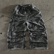 Vintage distressed print casual trousers