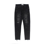 Raw-edge appliquéd cashew flower splattered straight ripped black jeans