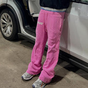 Fashionable personality contrast color fake two-piece trousers