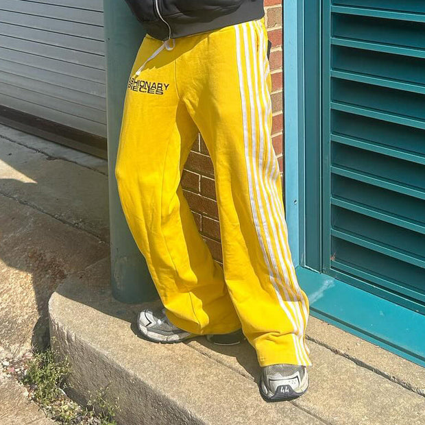 Fashionable personality contrast color fake two-piece trousers