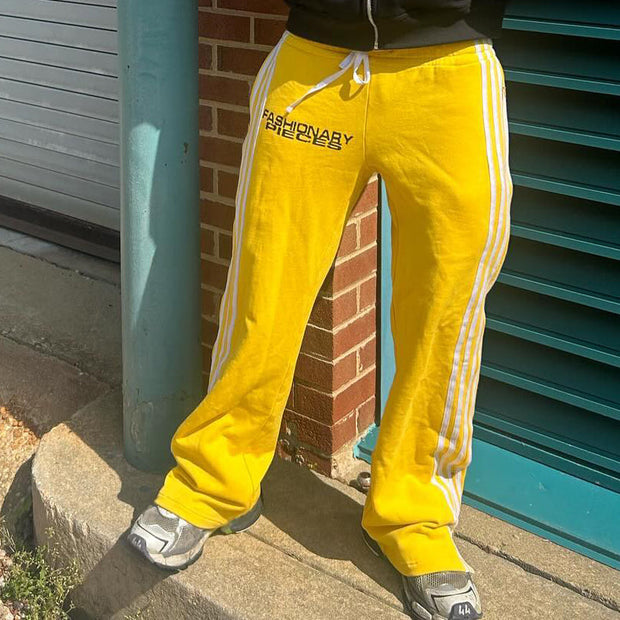 Fashionable personality contrast color fake two-piece trousers