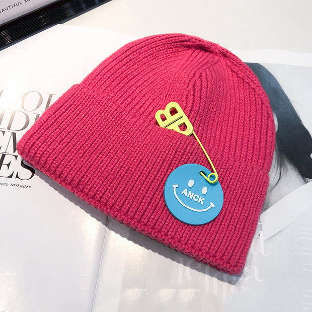 Fashion trend knitted hat female curled pin hip-hop smiley couple woolen hat winter warm hat male