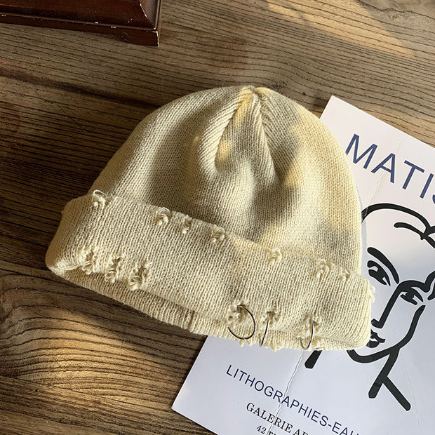 Trendy retro ripped knitted hat to keep warm