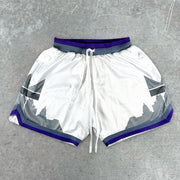 statement-print varsity track shorts