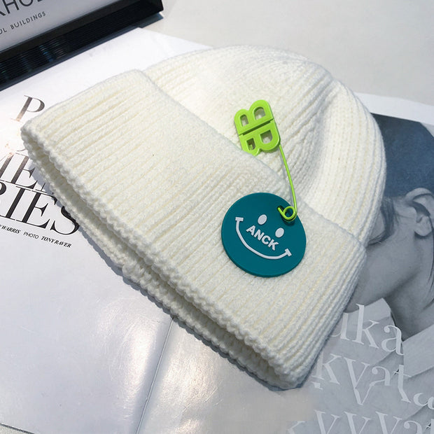 Fashion trend knitted hat female curled pin hip-hop smiley couple woolen hat winter warm hat male