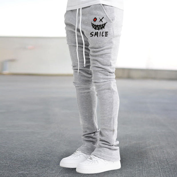 Retro street print flared slim-fit trousers